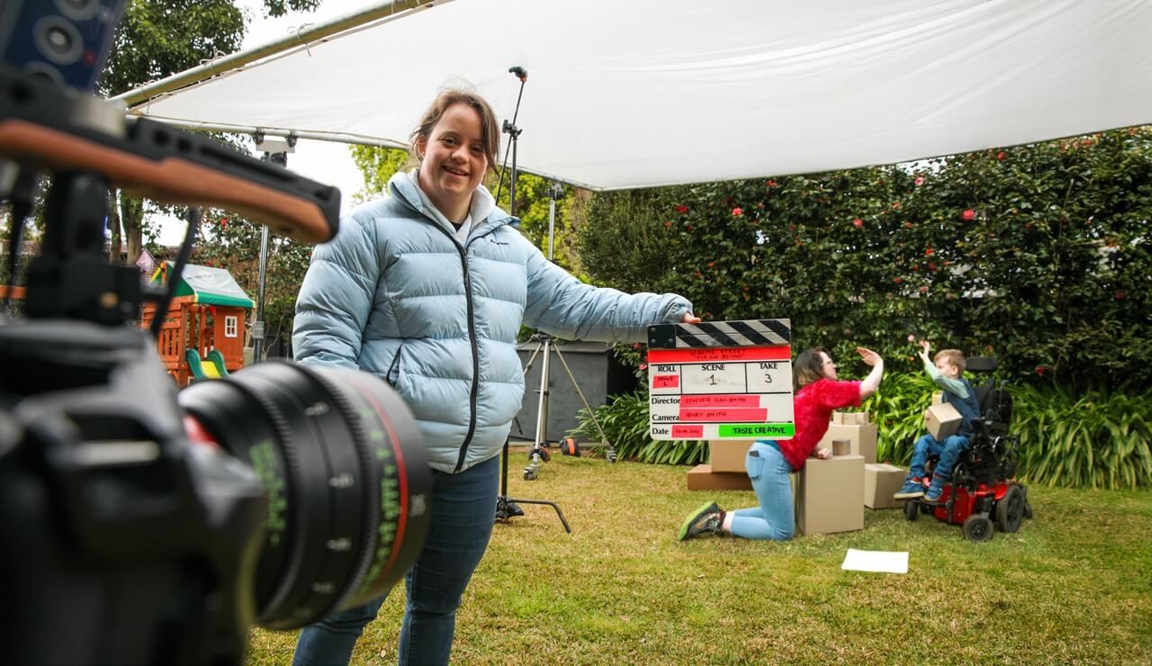 A diverse crew on the set of a film.